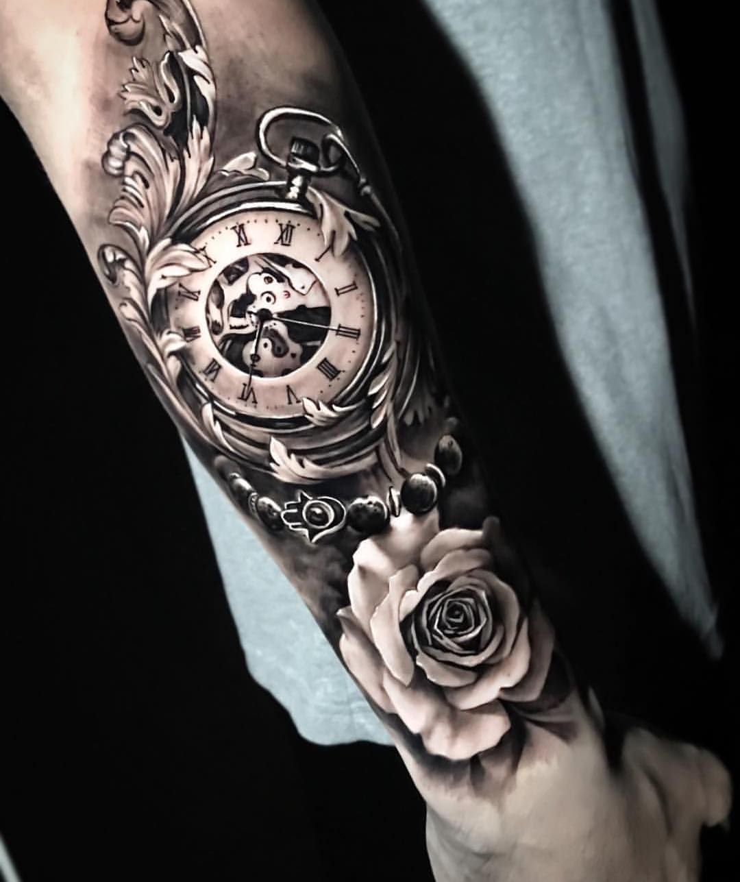 Татуировка в виде розы с часами: значение и символика